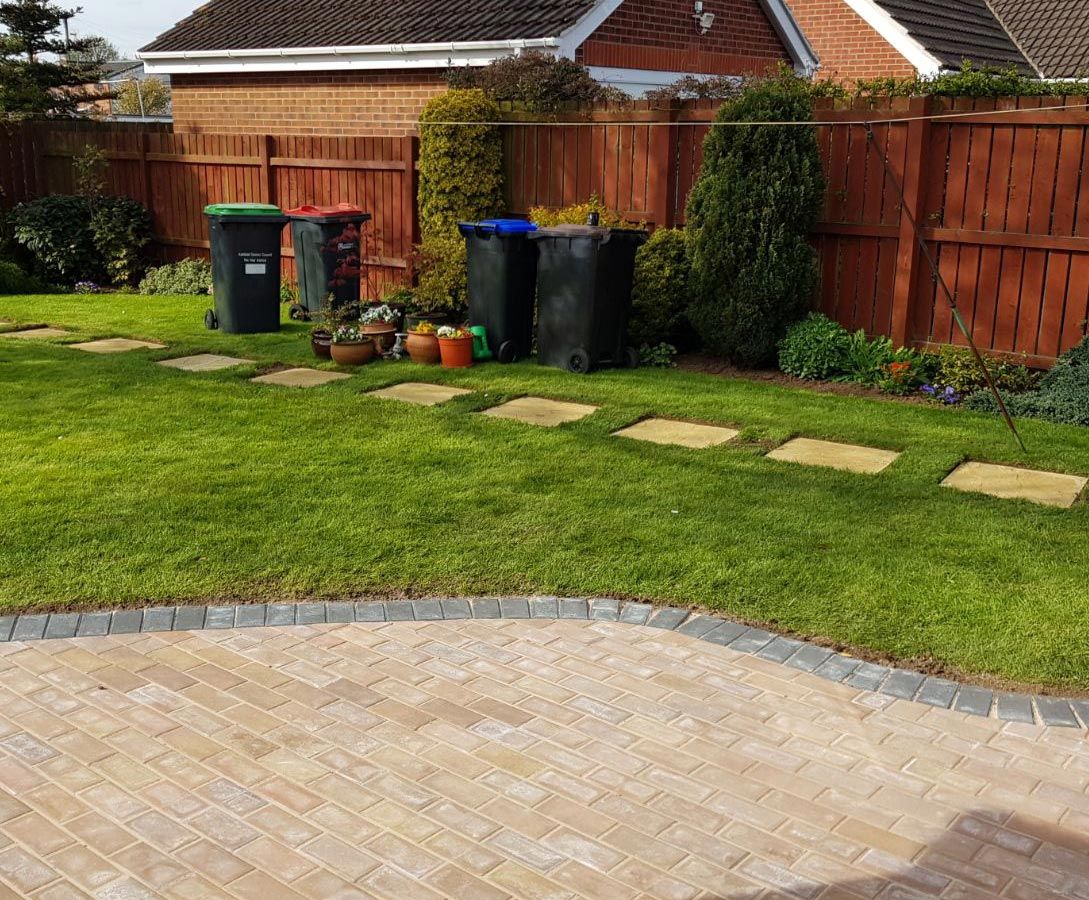 Work done by our team on a patio and new lawn for a domestic customer