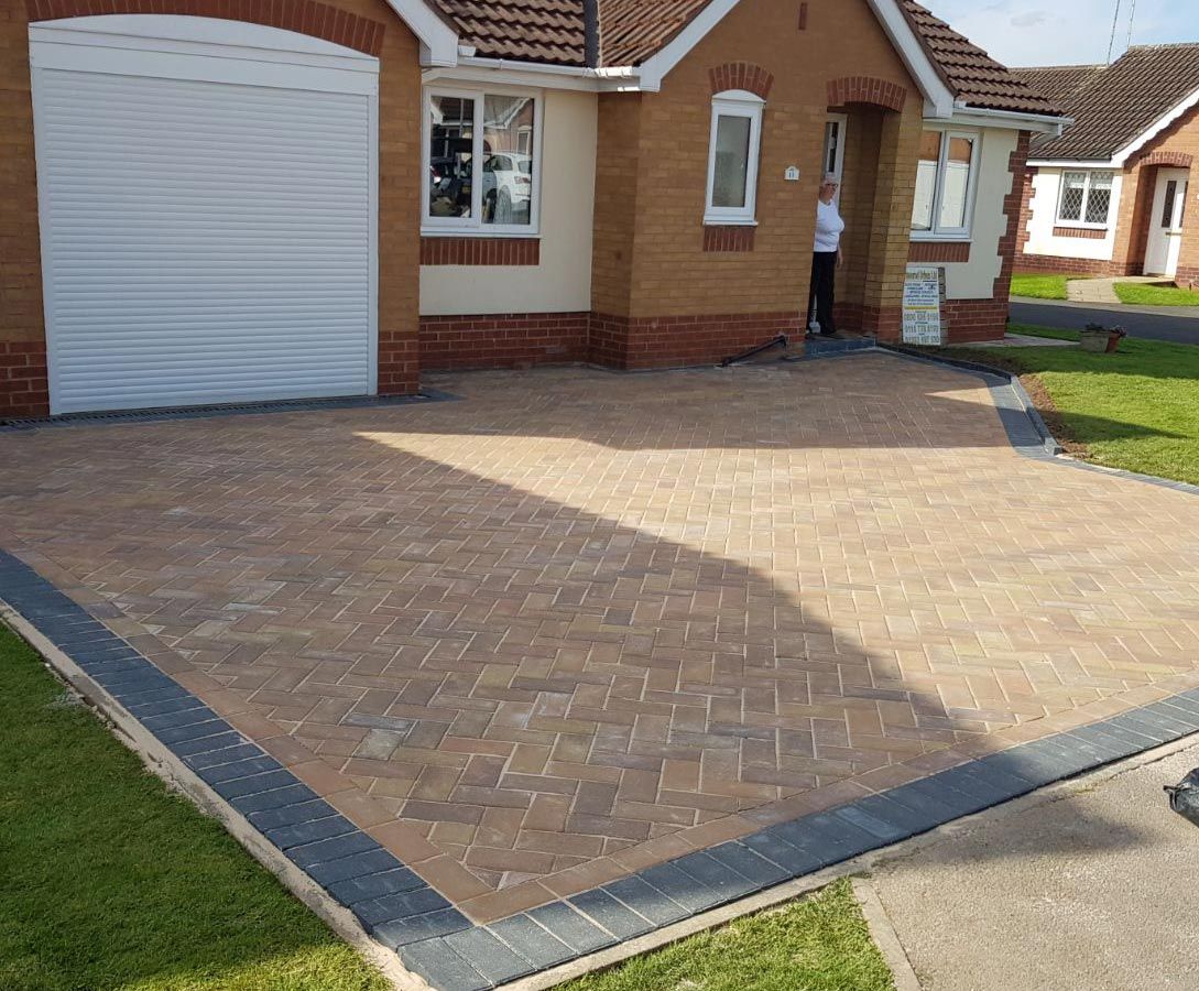 A brand new driveway outside a home
