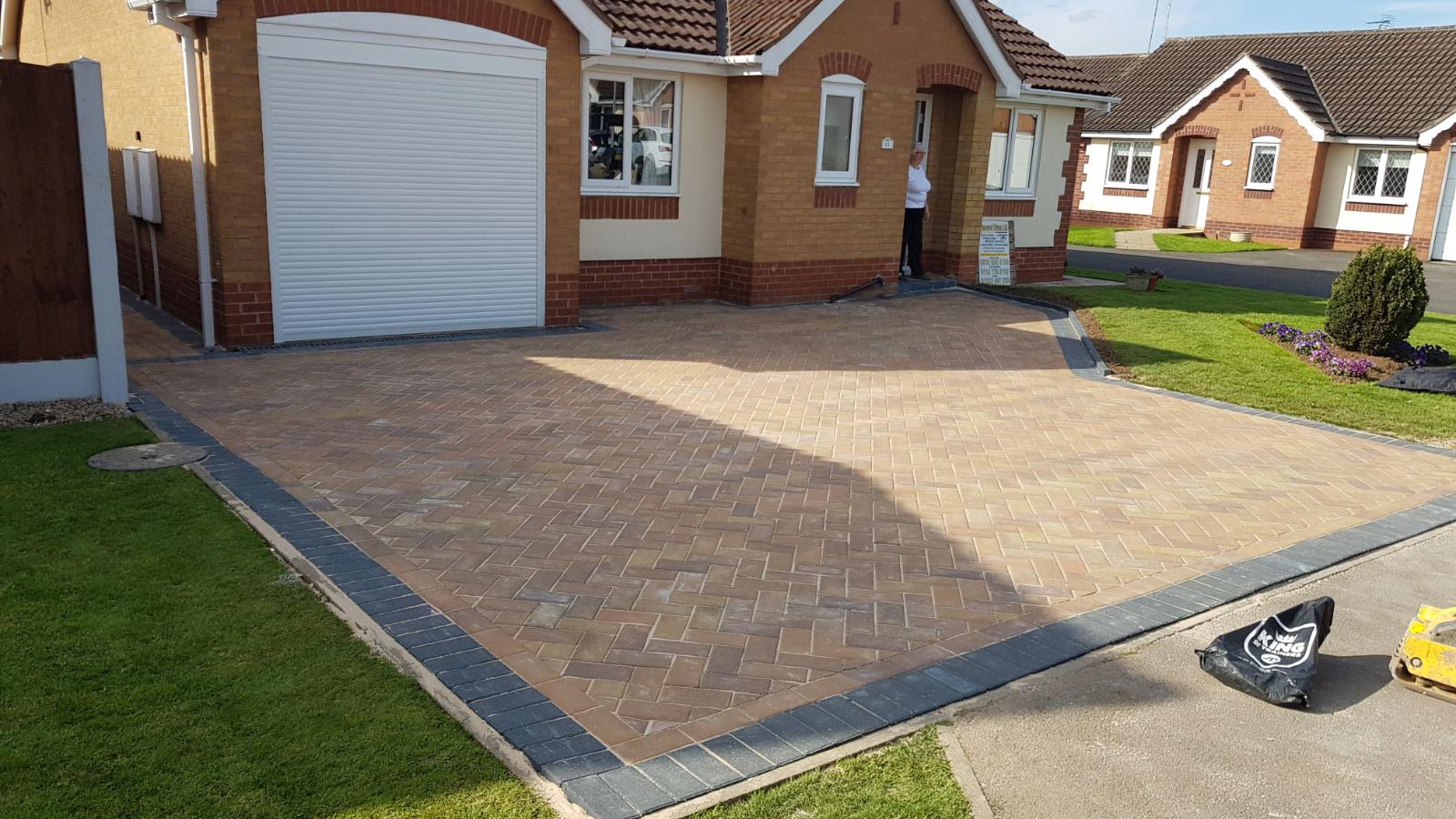 A brand new driveway outside a home